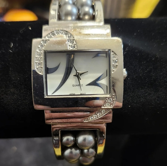 avon gray Accessories - Vintage Avon Gray Womens Cuff Watch